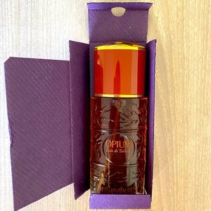 3.3 fluid ounce YSL Opium spray.